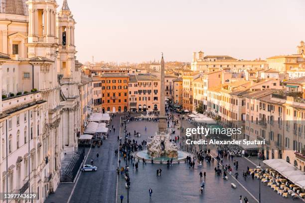 rome skyline and piazza navona at sunset seen from above, lazio, italy - italien altstadt stock-fotos und bilder