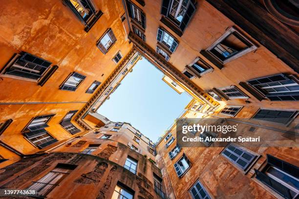 low wide angle view of residential apartments house inner court yard in rome, italy - rome italy 個照片及圖片檔
