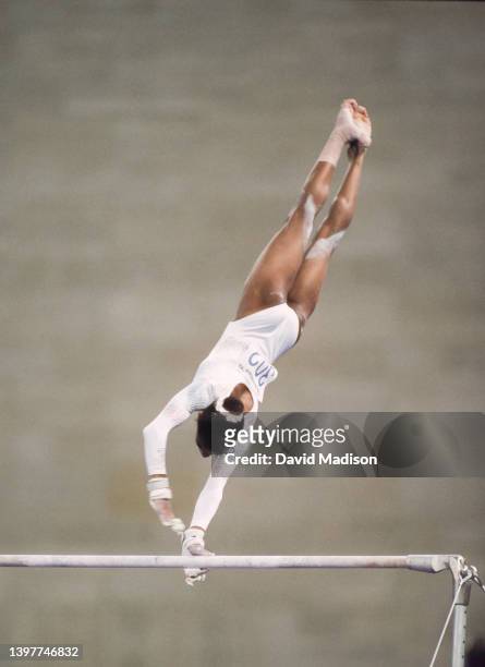 Dominique Dawes of the United States warms up on the Uneven Bars on July 28, 1992 during the Team All-Around event of the Women's Gymnastics...