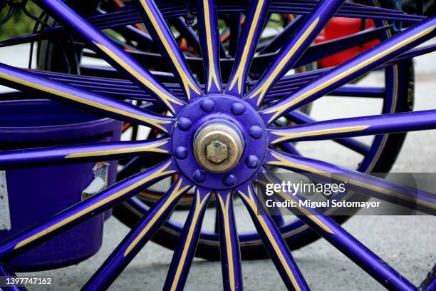 purple painted carriage - carriage wheel stock pictures, royalty-free photos & images