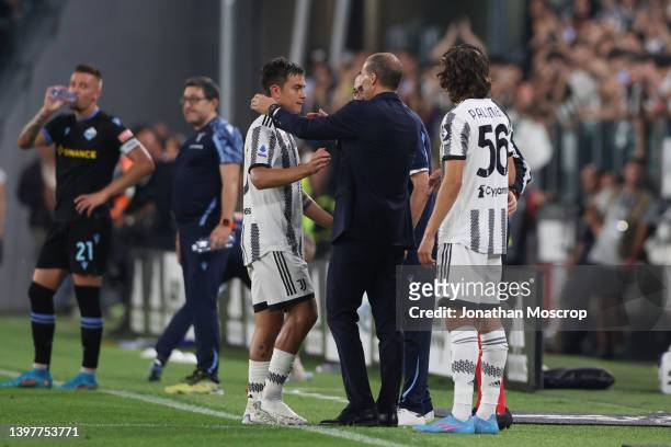 Paulo Dybala of Juventus is embraced by Massimiliano Allegri Head coach of Juventus as he is substituted for Martin Palumbo during the Serie A match...