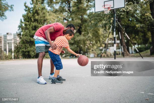 teaching dribble drive - basketball shoe stock pictures, royalty-free photos & images