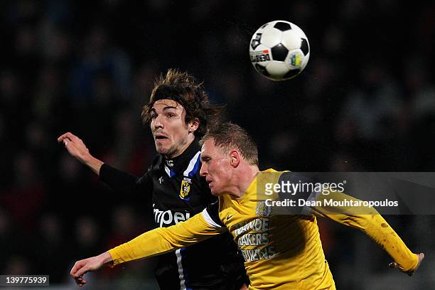 Henrico Drost of RKC and Mike Havenaar of Vitesse battle for the header during the Eredivisie match between RKC Waalwijk and Vitesse Arnhem at the...