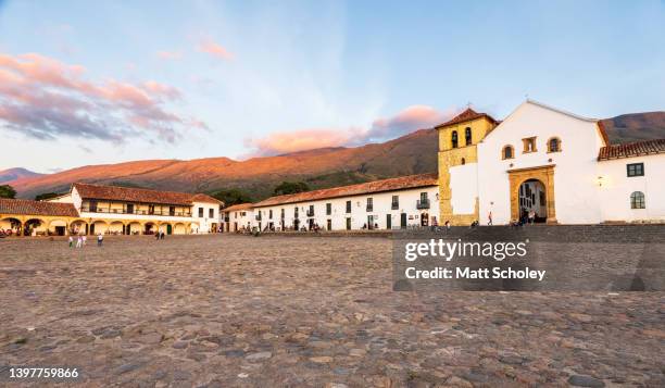 the town square (plaza mayor) at sunset; villa de leyva, boyacá, colombia - villa de leyva ストックフォトと画像