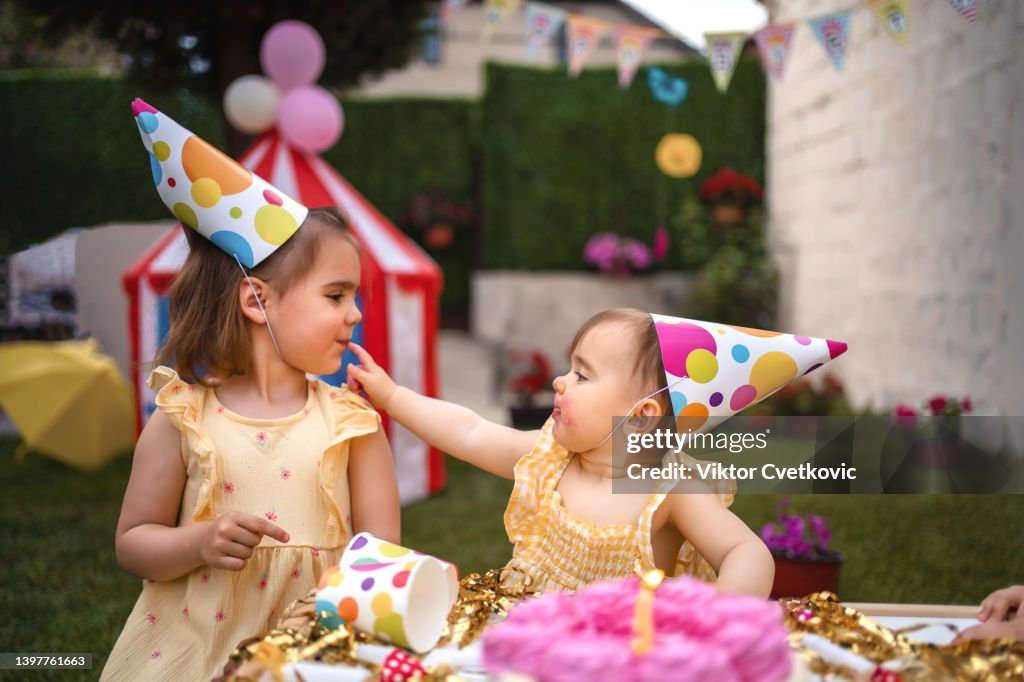 Sisters having fun on a birthday party
