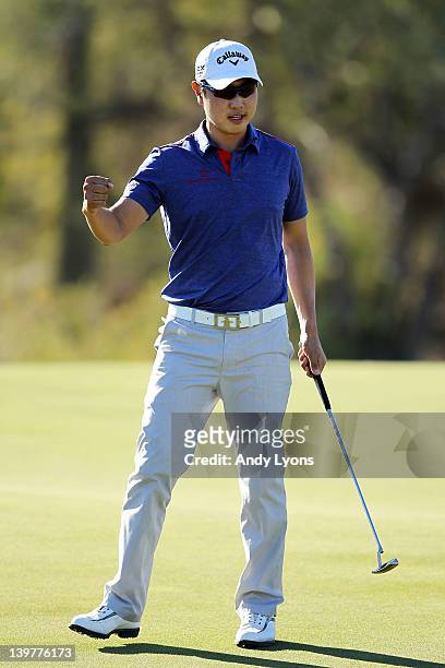 Sang-moon Bae of South Korea celebrates winning his match against John Senden of Australia on the 18th hole during the third round of the World Golf...