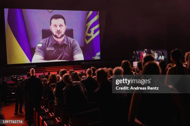 President of Ukraine Volodymyr Zelenskyy speaks in a live link-up video during the opening ceremony for the 75th annual Cannes film festival at...