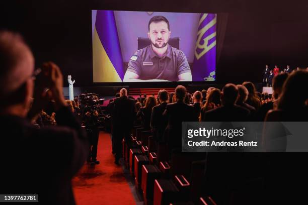 President of Ukraine Volodymyr Zelenskyy speaks in a live link-up video during the opening ceremony for the 75th annual Cannes film festival at...