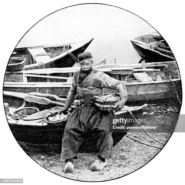 fisherman at scheveningen, netherlands - 19th century - catch of fish stock illustrations