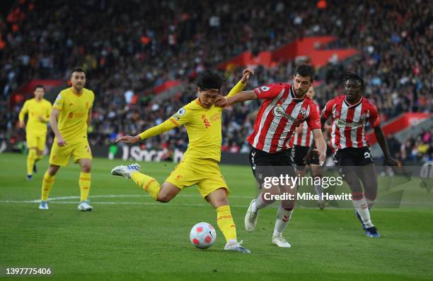 Takumi Minamino of Liverpool scores their sides first goal during the Premier League match between Southampton and Liverpool at St Mary's Stadium on...