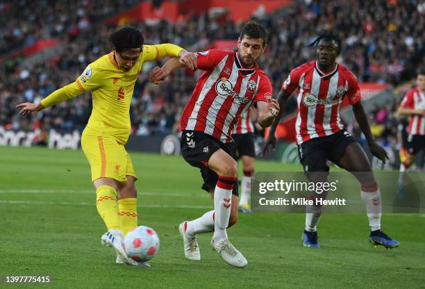 Takumi Minamino of Liverpool scores their sides first goal during the Premier League match between Southampton and Liverpool at St Mary's Stadium on...