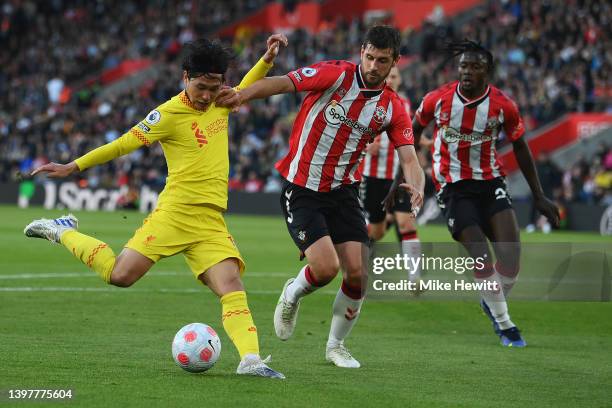 Takumi Minamino of Liverpool scores their sides first goal during the Premier League match between Southampton and Liverpool at St Mary's Stadium on...