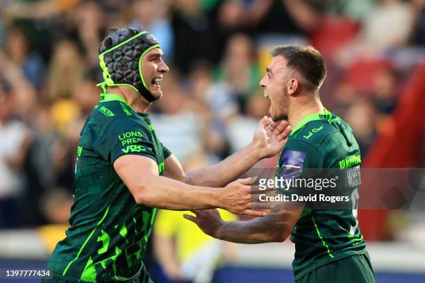 Ben White of London Irish celebrates scoring their side's first try with Rob Simmons during the Premiership Rugby Cup Final between London Irish and...