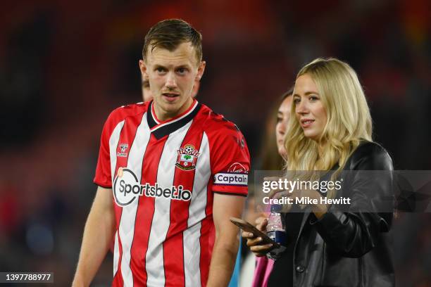 James Ward-Prowse of Southampton looks on with a member of their family after the Premier League match between Southampton and Liverpool at St Mary's...