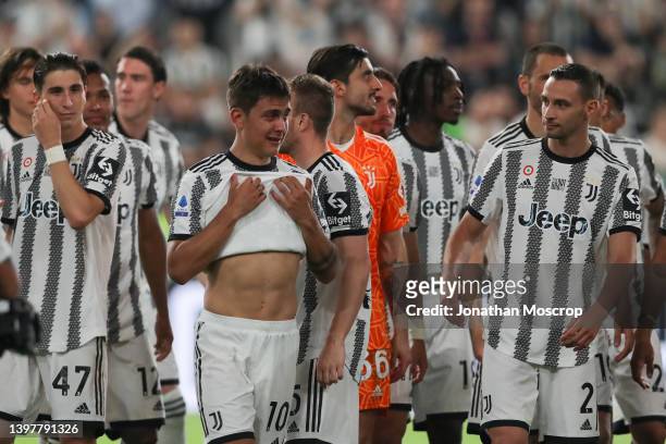 An emotional Paulo Dybala of Juventus cries amongst team mates following the final whistle of his last home game for Juventus at the Serie A match...