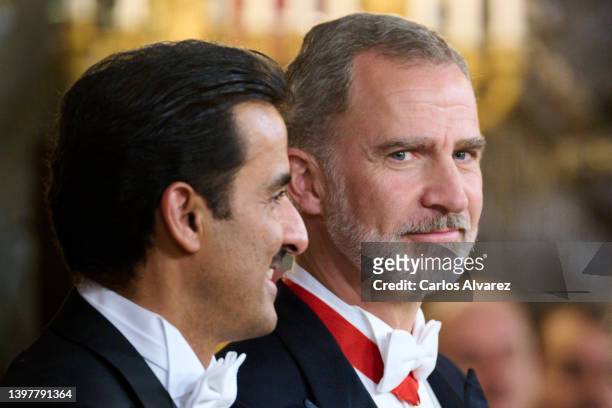King Felipe VI of Spain and Emir of the State of Qatar, Sheikh Tamim bin Hamad Al Thani attend a Gala Dinner at the Royal Palace on May 17, 2022 in...