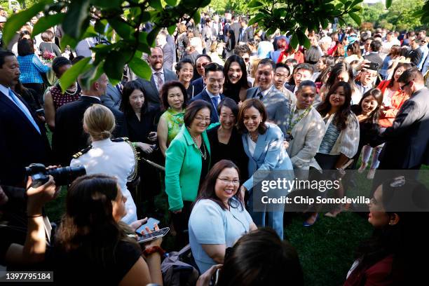 Vice President Kamala Harris poses for photographs with Sen. Mazie Hirono , Sen. Tammy Duckworth and others during a reception celebrating Asian...