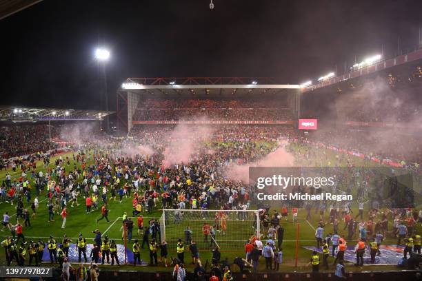 Notts Forest fans invade the pitch after winning the the Sky Bet Championship Play-Off Semi Final 1st Leg match between Nottingham Forest and...