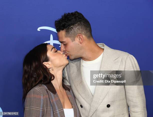 Sarah Hyland and Wells Adams attend the 2022 ABC Disney Upfront at Basketball City - Pier 36 - South Street on May 17, 2022 in New York City.