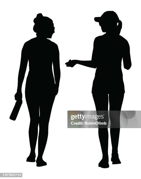 two young women walking and talking silhouette - woman full body behind stock illustrations