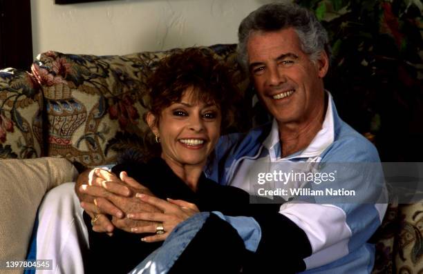 American actor and television host Jed Allan sits with his wife Toby at their home circa July, 1991 in Los Angeles, California.