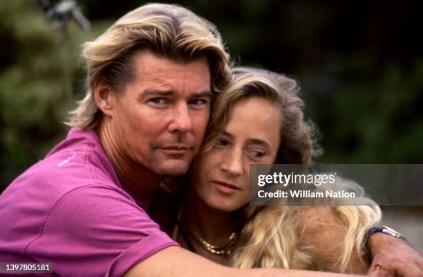 American actor Jan-Michael Vincent and his wife Joanne Robinson, pose for a portrait circa October, 1991 in Malibu, California.