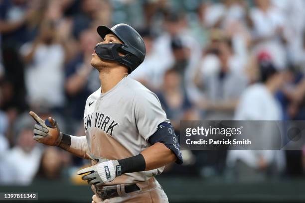 Aaron Judge of the New York Yankees celebrates after hitting a home run against the Baltimore Orioles during the third inning at Oriole Park at...