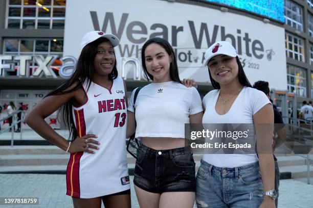 Miami Heat fans pose outside the arena prior to Game One between the Boston Celtics and the Miami Heat in the 2022 NBA Playoffs Eastern Conference...