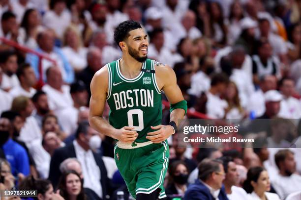 Jayson Tatum of the Boston Celtics celebrates a basket against the Miami Heat during the second quarter in Game One of the 2022 NBA Playoffs Eastern...