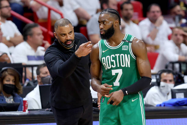 Head Coach Ime Udoka of the Boston Celtics talks with Jaylen Brown against the Miami Heat during the third quarter in Game One of the 2022 NBA...