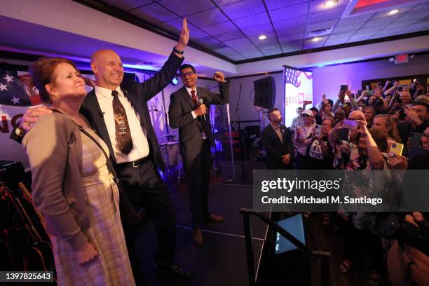 Republican gubernatorial candidate Doug Mastriano waves to supporters as he takes the stage to give a victory speech at his election-night party at...