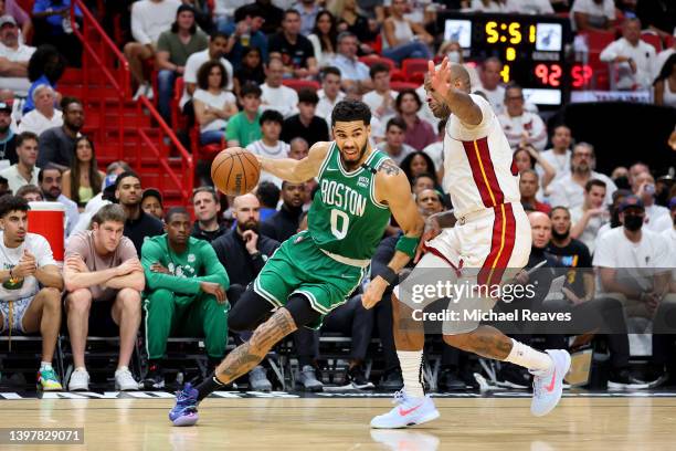 Jayson Tatum of the Boston Celtics drives to the basket against the Miami Heat during the fourth quarter in Game One of the 2022 NBA Playoffs Eastern...