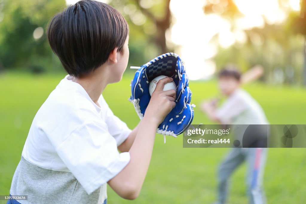 Young Boy Playing Baseball