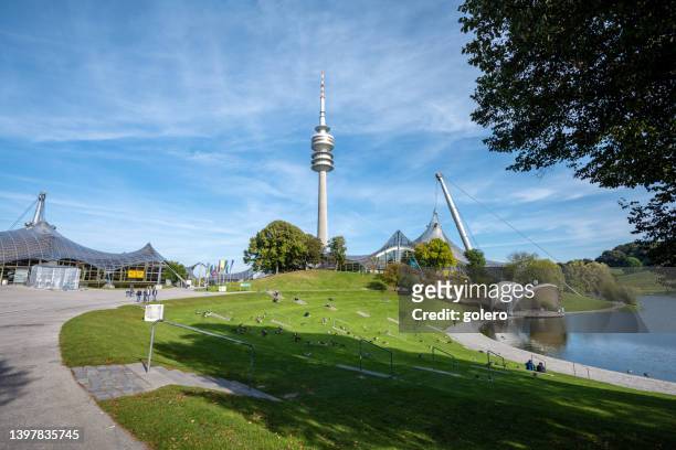 olympia park with olympia tower in munich - munich olympic park stock pictures, royalty-free photos & images