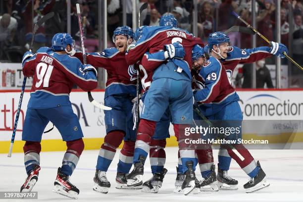 The Colorado Avalanche celebrate after the winning goal by Josh Manson against the St Louis Blues in overtime during Game One of the Second Round of...