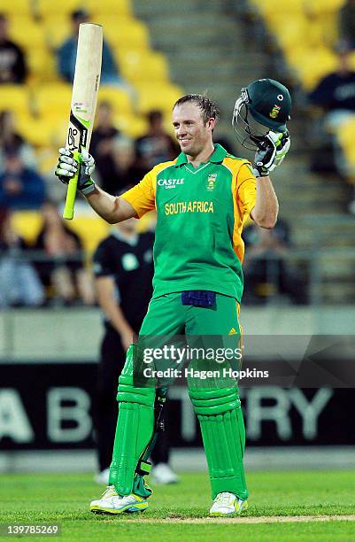 De Villiers of South Africa celebrates his century during the One Day International match between New Zealand and South Africa at Westpac Stadium on...