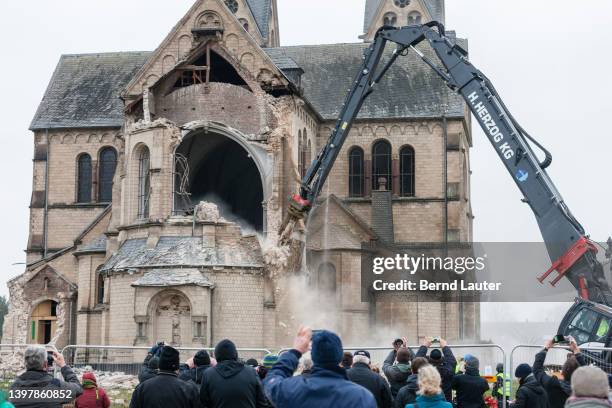 People films the demolition of St. Lambertus church with their smartphones on January 8, 2018 in Immerath, Germany. The hamlet is situated in the...