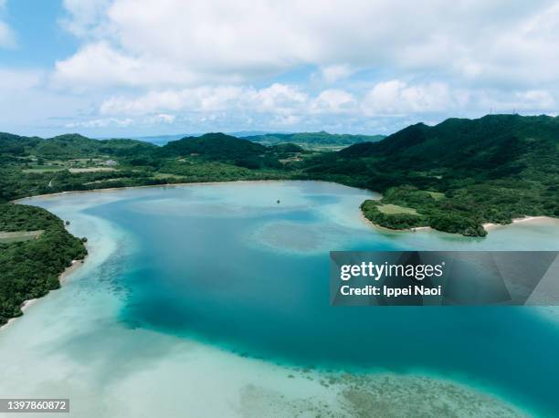 aerial view of tropical island lagoon, ishigaki, okinawa, japan - okinawa blue sky beach landscape stock pictures, royalty-free photos & images