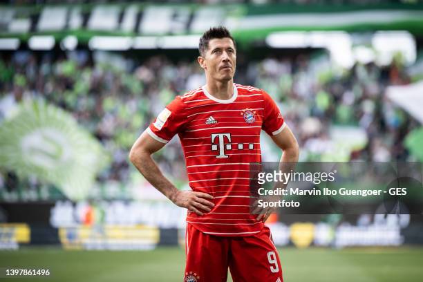 Robert Lewandowski of Munich looks on after the Bundesliga match between VfL Wolfsburg and FC Bayern München at Volkswagen Arena on May 14, 2022 in...