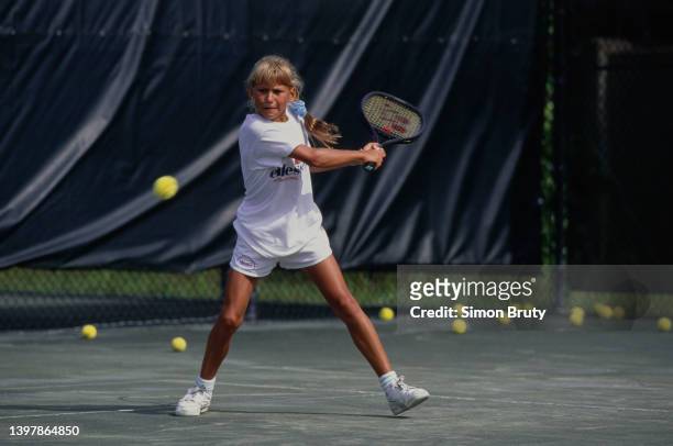 Year old tennis player Anna Kournikova from Russia plays a backhand return stroke during a coaching session at the Nick Bollettieri Tennis Academy on...