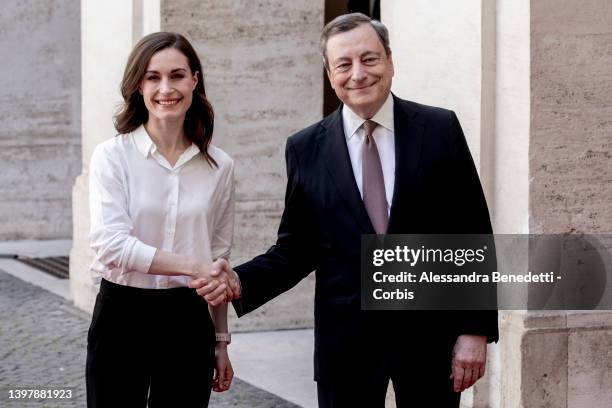 Italy's Prime Minister Mario Draghi welcomes Finland's Prime Minister Sanna Marin, at Chigi Palace, on May 18, 2022 in Rome, Italy. The 36-year-old...