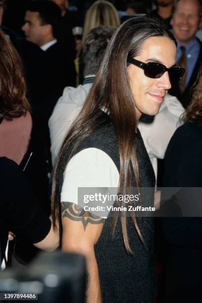American singer, songwriter and musician Anthony Kiedis attends the Westwood premiere 'There's Something About Mary' held at the Mann Village Theatre...