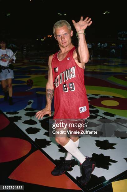 Australian-born American musician and actor Flea , wearing the red Rock N' Jock singlet, at the 3rd Annual MTV Rock N' Jock B-Ball Jam, held at UCLA...