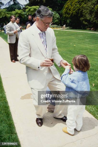 American magazine publisher Hugh Hefner and his son Marston Hefner attend the Playboy magazine Playmate of the Year presentation at the Playboy...