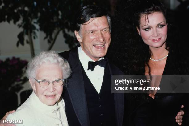 Grace Hefner , her son, American magazine publisher Hugh Hefner and his partner, Canadian actress and model Carrie Leigh attend the 15th Annual...