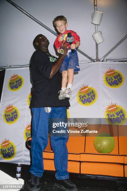 American basketball player Shaquille O'Neal and American child actor Jonathan Lipnicki attend Nickelodeon's 5th Annual 'Big Help-A-Thon,' held at Pan...