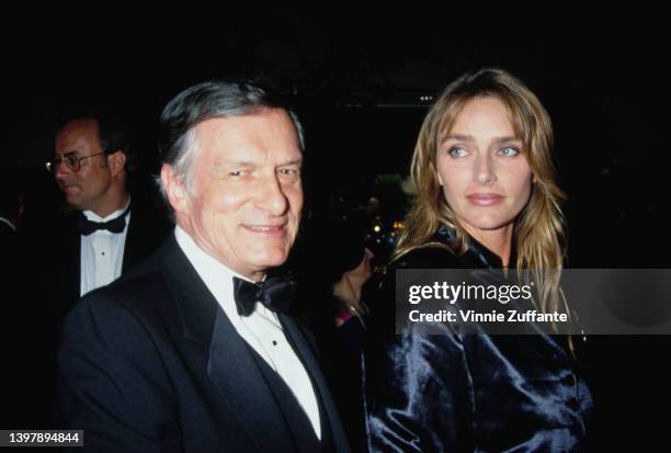 American magazine publisher Hugh Hefner and his wife, American model and actress Kimberley Conrad attend the presentation of Hefner's Friars Club...