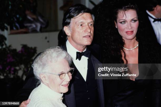 Grace Hefner , her son, American magazine publisher Hugh Hefner and his partner, Canadian actress and model Carrie Leigh attend the 15th Annual...