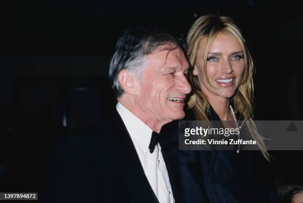 American magazine publisher Hugh Hefner and his wife, American model and actress Kimberley Conrad attend the presentation of Hefner's Friars Club...