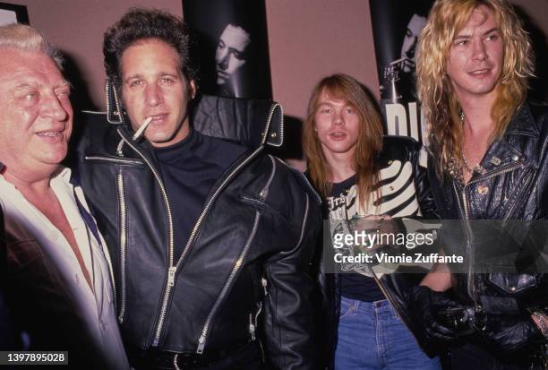 American comedian Rodney Dangerfield , American comedian Andrew Dice Clay, American singer-songwriter Axl Rose, wearing a black leather jacket with a...